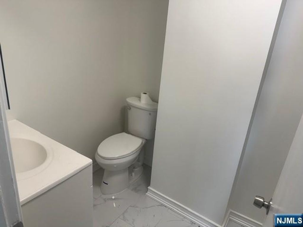 Photo of 250 12th Place, Prospect Park, NJ 07508 (MLS # 25041068)