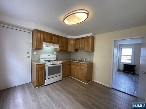 Photo of 49 Downing St #2, Newark, NJ 07105 (MLS # 26013997)