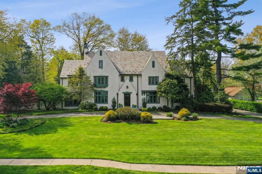 Timeless elegance meets modern luxury in this extraordinary 17-room Normandy Manor estate in South Orangeâ€™s coveted Montrose section. This magnificent 8-bedroom, 5.1-bath residence seamlessly blends historic grandeur with contemporary sophistication. Thoughtfully restored and meticulously maintained, the home sits on beautifully landscaped grounds and offers an exceptional lifestyle of elegance, comfort, and privacy. A Vermont slate roof and fully restored original windows showcase the homeâ€™s enduring craftsmanship. Inside, grand formal spaces, intimate gathering rooms, and exquisite details create a refined and welcoming atmosphere. A fully finished lower level provides versatile space for recreation, media, or guest accommodations. Step outside to a private backyard oasis featuring a stunning gunite pool with an integrated spa/hot tub, surrounded by lush gardens and multiple terraces ideal for entertaining or relaxing in total privacy. Luxurious bedroom suites and elegantly updated baths blend timeless charm with modern amenities. Perfectly located on a quiet, tree-lined street, yet just moments from South Orange Village, Midtown Direct trains to NYC, parks, and cultural attractions â€” this is truly one of South Orangeâ€™s most iconic and distinguished residences.