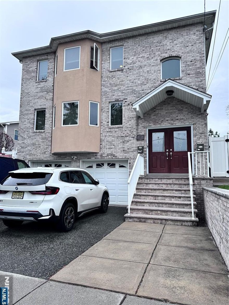 Beautiful 3 bedroom apt on 2nd floor, freshly painted. Features a Lg LR, Dining Area, Mod Kit w/ SS appliances, Granite Tops, Island, Tile Floor. Master BR w/ MBath. 2 additional BRs, 1 Full Bath. Hardwood Flrs as installed. Besslers to attic w/ small storage space available. Laundry in unit. Gas/forced hot air/Central Air. Close to transportation, NYC. on-street parking. No smoking. No Pets. Must see!