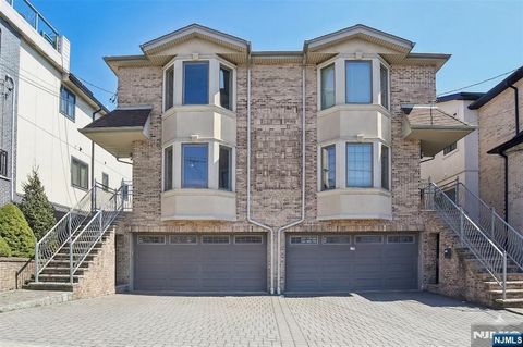 Photo of 128 Princeton Pl #A, Palisades Park, NJ 07650 (MLS # 26004820)