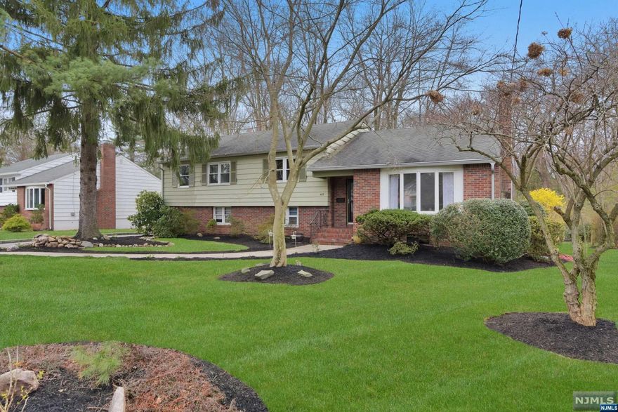 For appointment please call Bahr Rapaport 9178481784. Beautiful split-level house situated on a park-like property. This home has an entrance foyer that leads into the spacious living room with fireplace. A formal dining room, den and a newer eat in kitchen with skylights that leads out onto a deck and a patio. Second floor has a master bedroom with bath and 2 additional bedrooms with hallway bath. Lower level family room . Close to town recreation area, pool, close to parks, close to schools and transportation. New A/C unit installed. Ideal location!