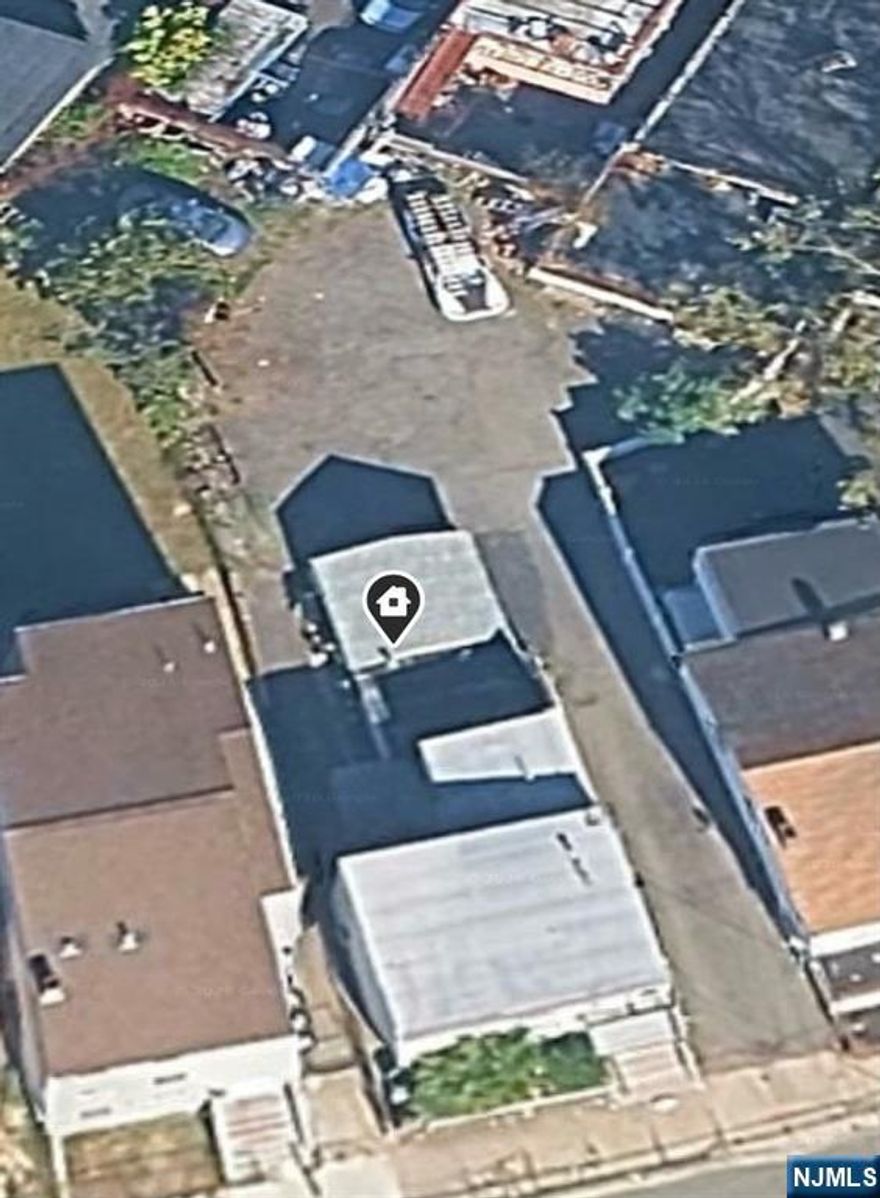 Welcome home to your huge double lot with driveway. Close to major highways and parking near New Development, NYC Transit, shopping and houses of worship. Both 2 bed 1 bath units currently occupied. Please do not walk on lot.