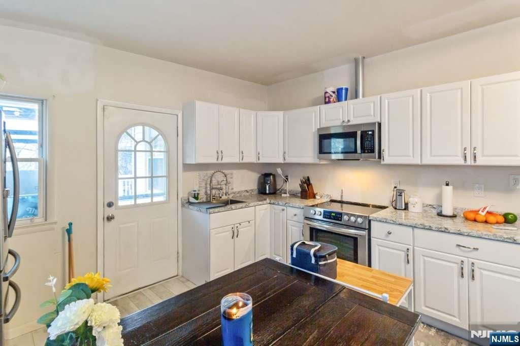 Photo of 1124 Belmont Avenue, North Haledon, NJ 07508 (MLS # 26004749)