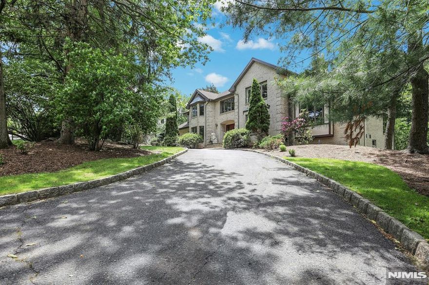 WELCOME TO 16 LOMAN COURT..A CUSTOM BUILT ALL BRICK RESIDENCE WITH MANY NEWLY ADDED UPGRADES.ENTER THE DOUBLE HEIGHT FOYER WITH SWEEPING BRIDAL STAIRCASE AND PROCEED TOWARDS THE ENORMOUS GREAT ROOM WITH VAULTED CEILING, SKYLIGHTS AND WET BAR WITH WINE REFRIGERATOR...ALL OVERLOOKING YOUR PRIVATE ALMOST 1 ACRE OF PROPERTY WITH AMPLE ROOM TO CREATE YOUR OWN PERSONAL OASIS. THIS 5 BEDROOM,5 .5 BATH HOME HAS AN UPDATED CHEFS STYLE KITCHEN WITH ALL NEW STAINLESS APPLIANCES AND A MASSIVE GRANITE ISLAND LEADING TO A NEWLY CONSTRUCTED DECK OVERLOOKING THE GROUNDS. A GUEST BR/FBTH,FORMAL DINING ROOM, EXTRA LARGE FORMAL LIVING ROOM, WOOD PANELLED OFFICE AND SOUND PROOF HOME THEATER COMPLETE THE MAIN FLOOR. UPSTAIRS A PRIMARY SUITE AWAITS WITH TRAY CEILING, CUSTOM WALK IN CLOSET AND SPA-LIKE MARBLE BATH.THE 3 ADDITIONAL LARGE BEDROOMS ALL HAVE SUBSTANTIAL WALK IN CLOSETS AS WELL AS HARDWOOD FLOORS.THE FOURTH BEDROOM IS OVERSIZED AND COULD BE SPLIT (CREATING A 6TH BEDROOM) OR USED AS AN UPSTAIRS DEN OR OFFICE. THE WALKOUT LOWER LEVEL WITH FULL SIZED WINDOWS ALLOWING FOR LOTS OF LIGHT HAS A GENEROUS OPEN AREA WITH PLUMBING FOR A KITCHEN, A GYM, FULL BATH AND LIBRARY. ALL THIS AND TOO MUCH MORE TO MENTION IN THE BEAUTIFUL TOWN OF CRESSKILL NEAR ALL MAJOR HIGHWAYS WITH AN EASY COMMUTE TO NYC.MOVE RIGHT IN!