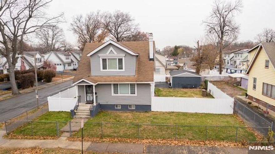 This Beautifully Sun Filled Home offers 3 bedrooms with Full Closet Space, Updated Kitchen with Granite Countertops w/Island, New Refrigerator, New Gas Range and Microwave. Main Floor features Recess Lighting, Hardwood Floors, Bright Foyer, Kitchen and Dining Room Combo and Half Bath. Located on the Second Floor all Three Bedrooms and Full Bath, Wood Blinds, Attic is Crawl Space. The Basement is Fully Finished including the Washer/Dryer. Central Heat and Air Condition, The Oversize Lot offers Large Yard with Privacy Fence surrounds the house and Two Car Garage plus parking for 6 cars. Home Security Camera Monitoring