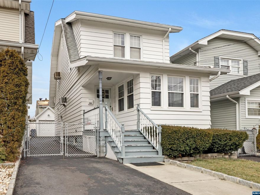 Lovely 3 bedroom, 1.5 bath Colonial featuring driveway and garage in desirable Arlington Section. The first floor offers a den, living and dining room, modern kitchen and a half bath. The second floor has 3 bedrooms, a full bathroom and pull down stairs to attic storage. The unfinished basement is full size with laundry, utilities, storage and has great potential for finishing. Property highlights include: hardwood and tiling flooring throughout, updated kitchen with granite countertops and stainless steel appliances, built in wall ac units, front porch, concrete patio and driveway for 3 car tandem parking plus one car detached garage. Located in Roosevelt School district.