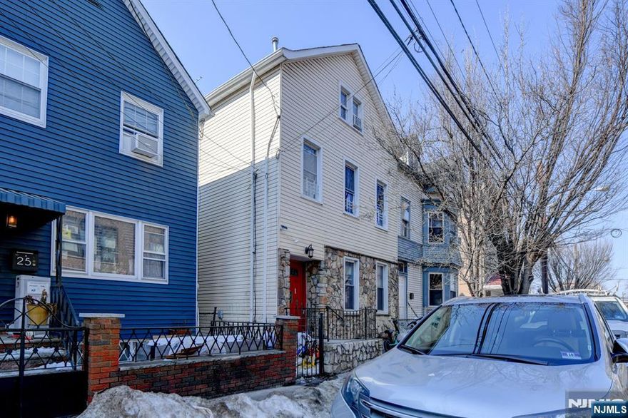 Two Unit Home in Newark's Highly Desirable Ironbound Exceptional investment or owner-occupant opportunity! This spacious two-unit residence offers a total of 8 bedrooms and 4 full bathrooms, with a kitchen and a living room in each unit. Both units feature generous room layouts, abundant natural light finished basement.