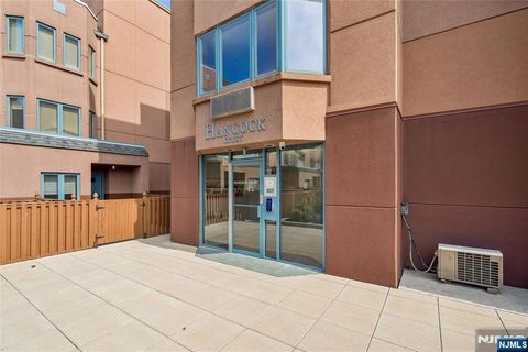 Photo of 403 Hancock Ct #M403, Edgewater, NJ 07020 (MLS # 26014311)