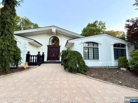 Photo of 8 Driftwood Drive, Livingston, NJ 07039 (MLS # 26029956)