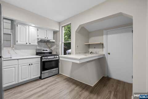 Photo of 292 Claremont AVE #1st Floor, Jersey City, NJ 07305 (MLS # 26030516)