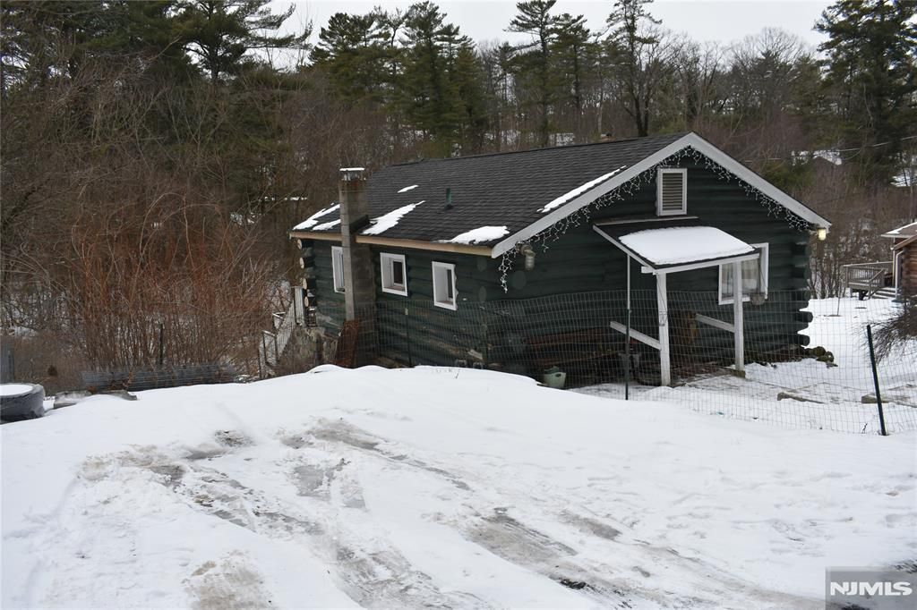 Photo of 71 Dockerty Hollow Road, West Milford, NJ 07480 (MLS # 26000542)