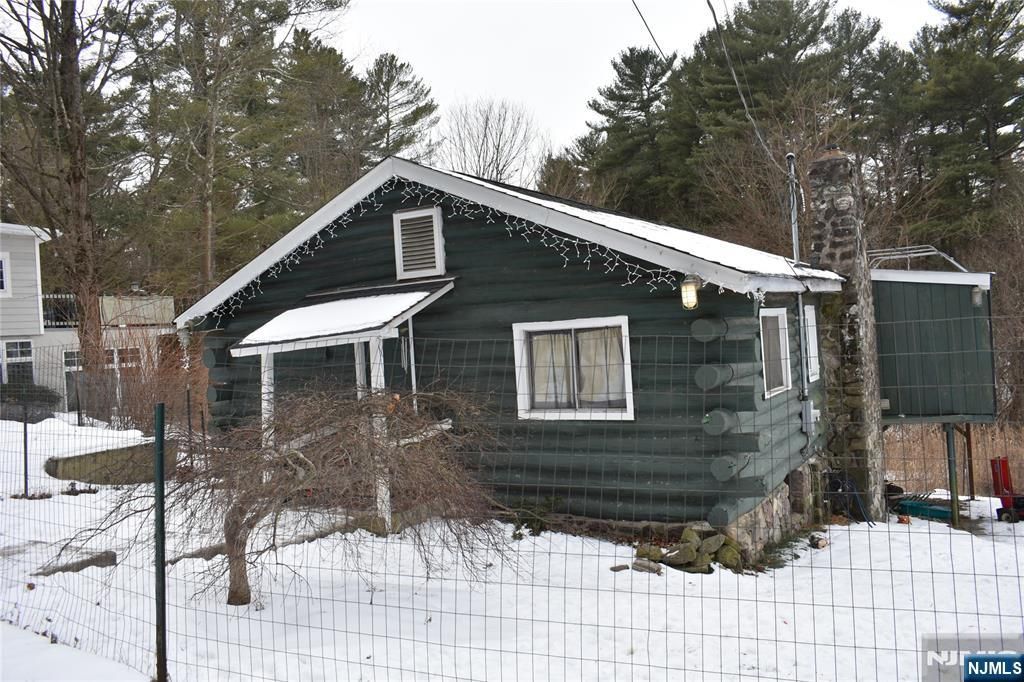 Photo of 71 Dockerty Hollow Road, West Milford, NJ 07480 (MLS # 26000542)