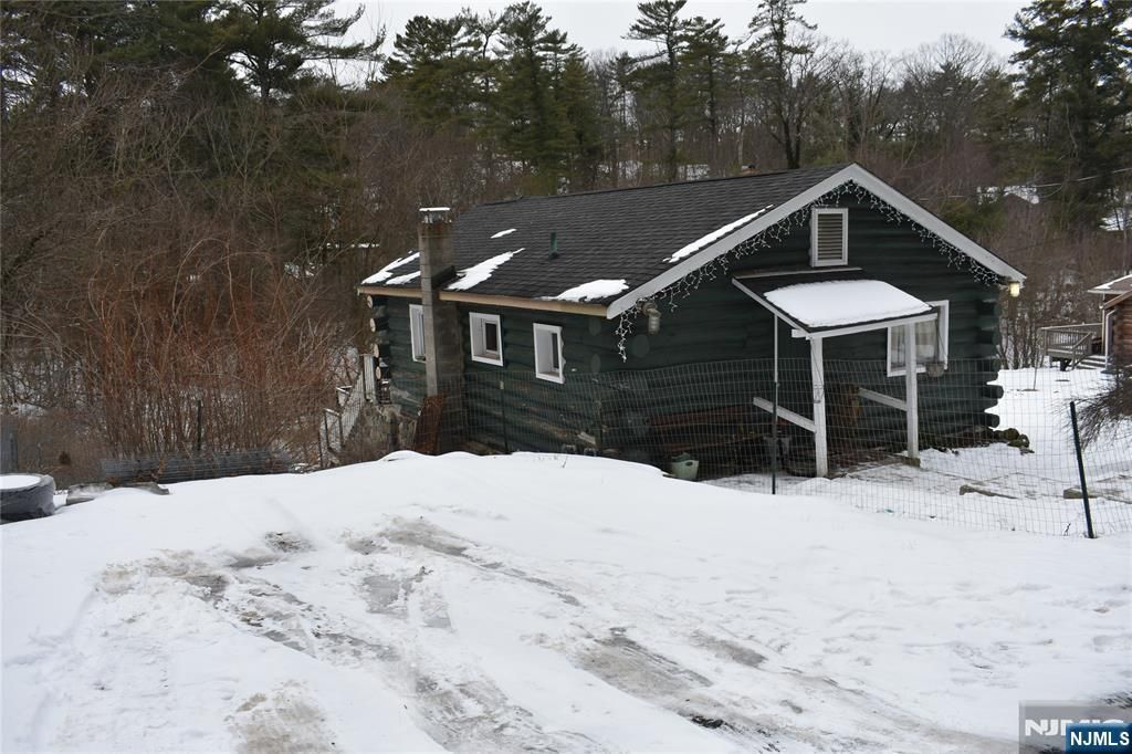 Photo of 71 Dockerty Hollow Road, West Milford, NJ 07480 (MLS # 26000542)