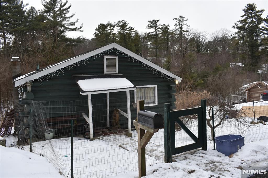 Photo of 71 Dockerty Hollow Road, West Milford, NJ 07480 (MLS # 26000542)