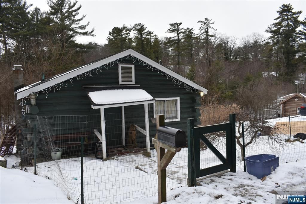 Photo of 71 Dockerty Hollow Road, West Milford, NJ 07480 (MLS # 26000542)