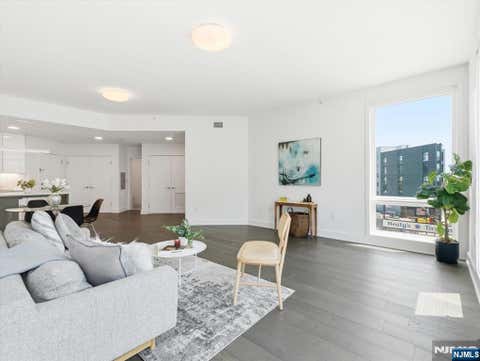 Photo of 380 Newark Avenue #406, Jersey City, NJ 07302 (MLS # 26027783)