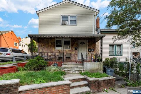 Photo of 68 Belmont Avenue, Paterson, NJ 07522 (MLS # 25035188)