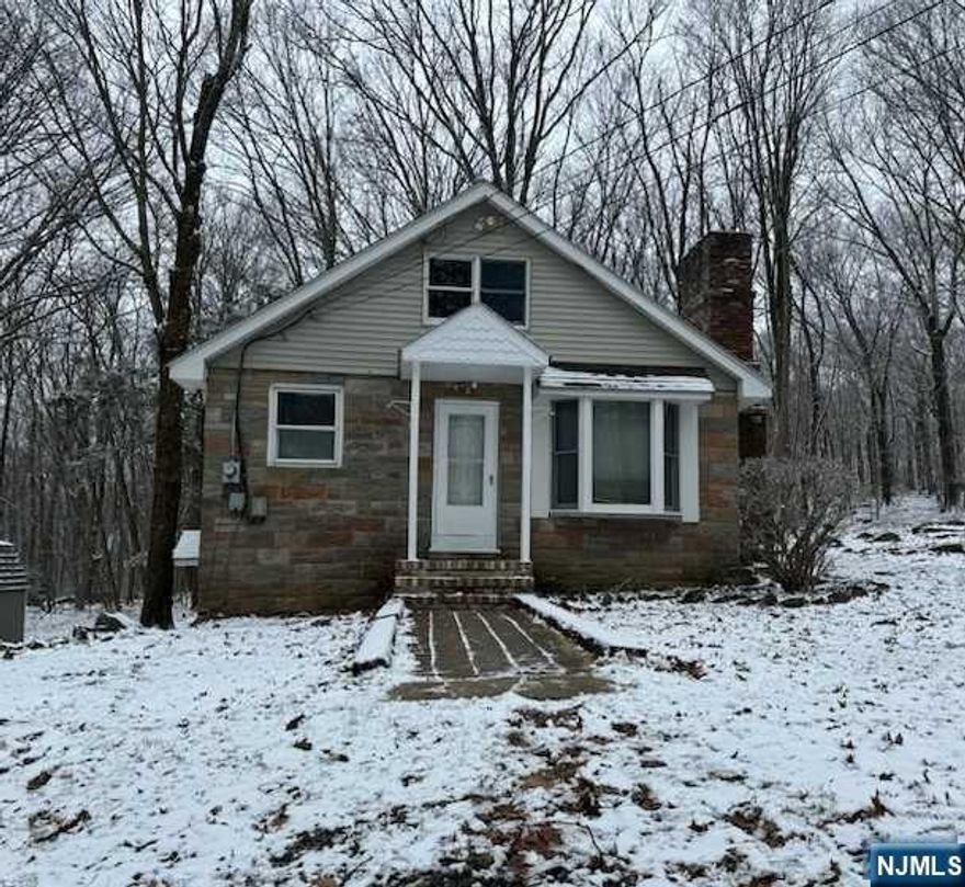 Discover the charm of rustic cabin living in this serene retreat located on a peaceful dead-end street. With a practical layout on the first floor, this home includes two bedrooms, a bathroom, and a cozy eat-in kitchen. The living room features hardwood floors and a welcoming fireplace, perfect for creating a warm ambiance. The finished attic provides extra space that can be utilized as a home office, guest room, or hobby area. Outside, a large shed offers additional storage, and the property itself offers plenty of open space and privacy at the end of the cul-de-sac. Located just 5 minutes from Crystal Springs ski resorts, this area provides abundant out. Subject property, also includes 8 Woodside Dr lot (50 x 100)-Property being SOLD AS-IS. Owner makes no representations. Buyer to conduct their own due diligence will continue to show until fully executed contract. Seller does not intend on making any repairs to the property. Septic 30yrs old, functional but unlikely to pass test