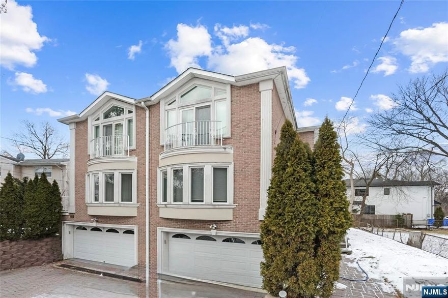 Well-maintained and spacious townhouse rental featuring 3 bedrooms and 3.5 bathrooms, located in the highly desirable town of Tenafly, known for its Blue Ribbon schools and convenient access to NYC. The main level offers an open-concept living and dining area, along with an eat-in kitchen complete with a breakfast bar, granite countertops, stainless steel appliances, and sliding doors that lead to a private deck and backyard. The top level includes three generously sized bedrooms and two full bathrooms. The lower-level den offers an additional full bathroom, a dedicated laundry room, and direct access to the two-car garage. Additional highlights include hardwood floors throughout, recessed lighting, abundant closet space, and extra driveway parking. Tenant is responsible for all utilities and snow removal. Landscaping is maintained by the landlord. Credit check, proof of income, and ID are required. A small pet may be considered.