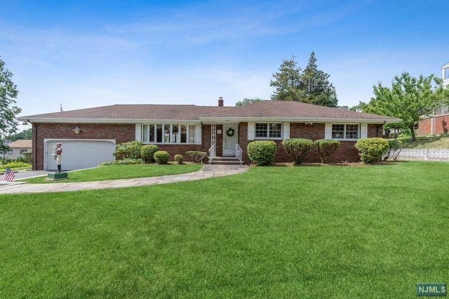 Stylish all brick ranch home; meticulously maintained through the years. Features include Multi- Generational Capabilities with separate entrance- Flexible Floorplan-Expansive Walk Out Basement-Primary En Suite Bath-3 Full Baths- Tile & Hardwood Floors-Eat In Kitchen-Replacement Windows Throughout-Attached Garage/ Walk Out-Wet Bar and Summer Kitchen-Central Air Conditioning-Whole House Attic Fan-House Fire & Security System-Underground Sprinkler System-Central Vacuum-Retractable Awning-Fenced in Yard-Storage Galore-Built in Gunite Pool-Large Corner Lot--Totowa Boro Low Taxes!!-Convenient Location-Minutes to St. Joseph's Medical Center, Montclair State & William Paterson Universities.