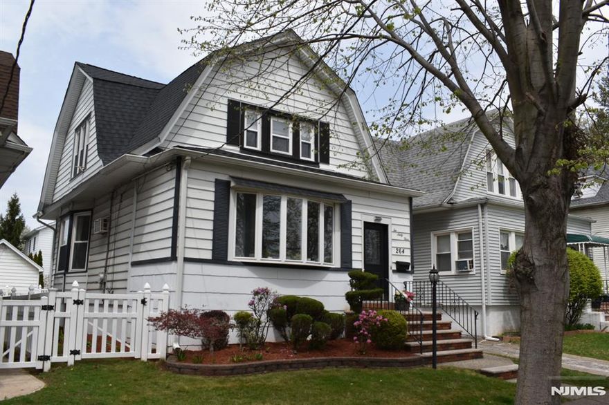 Welcome Home! Pride of ownership is evident from the moment you drive up to this beautiful 3 BR 2BA Colonial! Home includes a bright and spacious sunroom with 3 closets for plenty of storage. First level includes a living room, which flows into a sunlit dining room, both rooms featuring beautiful Brazilian Cherry hardwood flooring. The kitchen opens into the dining room and features granite countertops with stainless-steel appliances. Completing the first level is a full bath, and the laundry room. The second level is comprised of the main bedroom featuring two walk-in closets, two additional bedrooms, and a second full bath. The finished basement adds additional living space including a family room, wet bar, utility room with newer furnace, and storage area. The exterior of the home boasts a backyard retreat that you can admire from your deck or entertain in the privacy of a fully fenced-in yard. Near public transportation and major highways makes this home a commuterâ€™s delight!