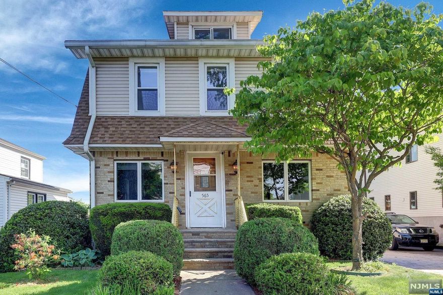 Well kept 2 fam w/detached oversized 1 car garage & paverstone driveway.1st fl: liv rm, kitchen w/access to rear composite deck w/vinyl railings, 2 bedrms & full bath. 2nd & 3rd fl used together & consist of living rm, kitchen, dining rm, 2 bedrms & full bath. 3rd fl spacious bedroom w/skylight. 2nd floor dining rm may double as possible 3rd bedrm. Finished Basement has zoned electric heat for added comfort w/recreation rm, wet bar, full bath, laundry rm & 2 storage rooms-wine racks included! Hardwood floors, modern kitchens w/tile floors & granite tops w/tile backsplash. 2nd fl kitchen has wine cooler. Modern tiled bathrooms-2nd floor bath has heated floor. Crown molding. Gas steam radiator heat boiler approx 13 yrs old, oil tank removed.Hot water heater 5 yrs old. Vinyl replacement windows,leaf guards, 2 separate gas & 100 amp electric meters. 5 built in wall air conditioners,2 refrigerators & washer,dryer.2 min to NYC bus stop, Train Station less than 3/4 miles (14 min) away.