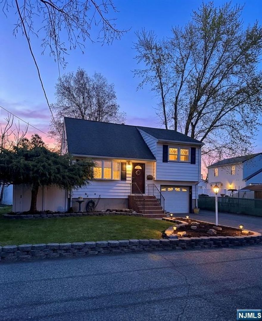 Updated oversized 3 bedroom split level home in great neighborhood! Beautiful hardwood floors throughout the whole house. Open floor plan leads to updated eat in kitchen with stainless steel appliances and a fantastic family room with high ceilings. Upstairs offers 3 spacious bedrooms and a full bathroom. The basement provides a bonus