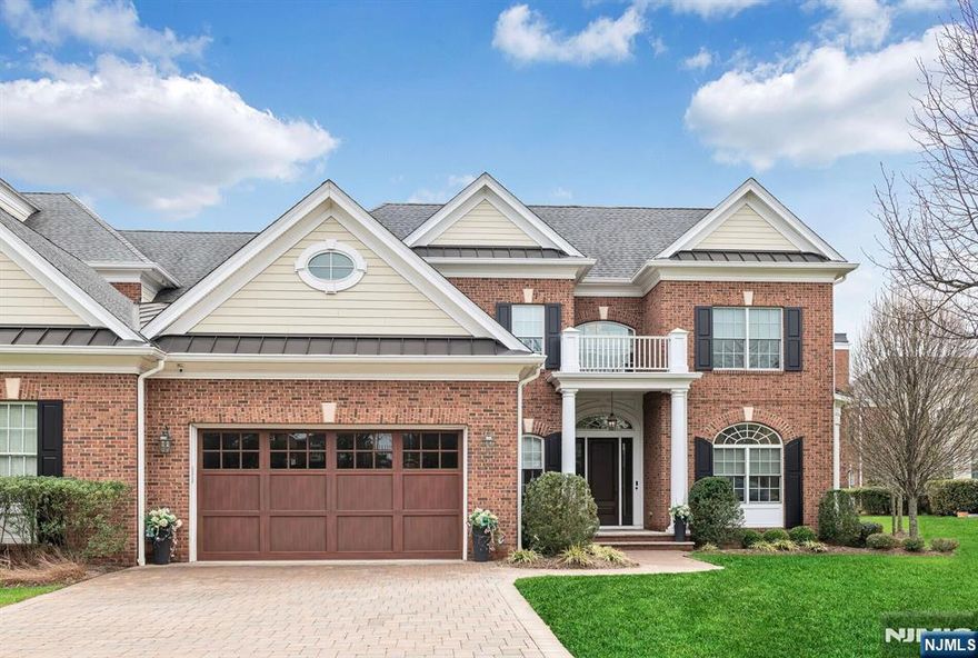 Exceptional opportunity at The Saddle River Grand. Designer-end-unit townhome offers 3 bedrooms, 4.5 baths, thoughtfully designed across 3 levels w/ elevator servicing every floor & whole house generator. The main level features gourmet kitchen w/ granite counters, seated center island, walk-in pantry, 36â€ Wolf range & oven, Wolf microwave, Miele dishwasher, & Sub-Zero refrigerator. Banquet-sized DR w/ butlers pantry. Addâ€™l main lvl highlights include an office w/ French doors, built-ins & window seat, powder rm, mudrm w/ built-ins, & laundry rm. Great room w/ cozy gas FP. Bkfst rm w/ sliders to private patio w/ awning, built in grill & privacy trees. Upstairs is a versatile loft/sitting area. The lux primary ste features a tray ceiling, 2 walk-in closets, & a spa-like bath w/ oversized shower, dual sinks, makeup vanity, soaking tub, & water closet. Secondary BRs are generously sized, including private ensuite & WICs. The lower lvl is an entertainerâ€™s dream, w/ spacious rec & billiards room, wet bar w/ dual beverage refrigerators, full bath, & private theater featuring surround sound, projector, & screen. Additional lux features: heated garage, custom built-ins throughout, bespoke closets, designer lighting, integrated audio, exceptional millwork & finishes. Residents enjoy a gated lifestyle w/ guard house, clubhouse, fitness, & pool. Low Saddle River taxes & reasonable HOA fee. A rare opportunity to enjoy turnkey luxury in one of Bergen Countyâ€™s most desirable commun