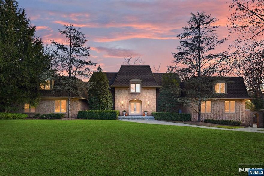 Take advantage of this exceptional value of nearly 9,000 sq. ft. of refined living in the coveted Winton Gate section of Franklin Lakes. This impressive 7-bedroom, 6.5-bath residence sits proudly on a beautifully landscaped corner property and offers an extraordinary combination of scale, luxury, and functionality rarely found at this price point. Inside, the home unfolds with grand, light-filled living and entertaining spaces designed for both everyday comfort and large-scale gatherings. The residence features dual kitchens, including a full secondary kitchen and a main chefâ€™s kitchen equipped with high-end Sub-Zero refrigerationâ€”ideal for hosting, extended living, or multi-generational use. Four spacious ensuite bedrooms provide exceptional privacy, while additional bedrooms and flexible rooms easily accommodate offices, playrooms, or guest suites. The resort-style backyard serves as a private retreat, highlighted by a sparkling heated pool, lush landscaping, and multiple zones for lounging, dining, and indoor-outdoor entertaining. A three-car garage and elegant paver driveway complete this sophisticated offering. Located in one of Bergen Countyâ€™s most desirable communities with top-rated schools, Franklin Lakes also provides convenient commuter bus service to NYC. A rare opportunity to secure incredible square footage, premier location, and luxury amenities in sought-after Franklin Lakes.