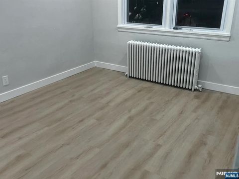 Photo of 269 Desoto Pl, Fairview, NJ 07022 (MLS # 26007191)