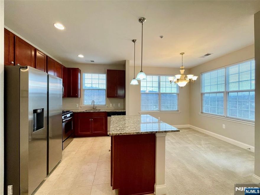 LIVE THE GRANDE LIFE! Available Feb 2nd. "Hickory" model 2 bedroom, 2 bath condo on the 3rd flr w/1152 sf of elegant living space & amazing mountain views! Private end unit located just steps away from the side entrance. Assigned parking space in garage with additional parking outside. Featuring 2 bedrooms w/walk-in-closet each bedroom. The primary bedroom has a full bath. There is a computer room/office. Bigger kitchen w/center island, beautiful kitchen cabinets, granite countertops & SS appliances. Balcony off kitchen. Laundry room accommodates full size washer & dryer side by side! Live the Grande life and enjoy all the Grande amenities which include 2 clubhouses, 2 pools, billiards rm, tennis & basketball courts, fitness ctrs., & much more. Assigned parking in grge. Add'l parking. Required lease application, credit check, employment verif. Credit score 700+, 1st mth rent & 1 1/2 mth security dep. $400 Grande move in fee & $750 refundable sec dep. No Smoking. No Pets.