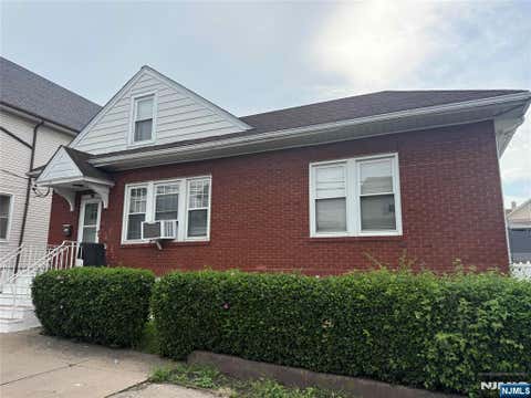 Photo of 24 Quinn Street, Paterson, NJ 07501 (MLS # 26030952)