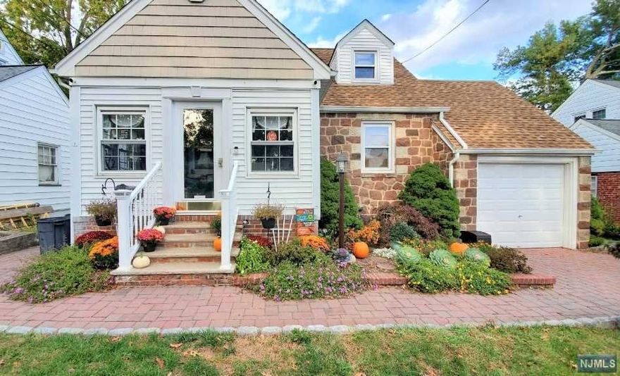 Don't miss this great One Family home in desirable section of Union. Situated on a large 50' x 100' Lot this home boasts 4 Bedrooms! 3 Full Baths! Hardwood Floors! Updated Kitchen with Granite Counters! Living Room with Gas fireplace! 2 Zone Central A/C! Gas Heat! Tankless Water Heater! Updated Electric! Security System! Newer Timberline Roof! Newer Windows! Recessed Lighting! Full finished basement with Huge Family Room, Large Office and Full Bath! French Drain System! Large Deck great for entertaining! Double-wide Paver block driveway for plenty of parking! One Car attached Garage with storage loft! A Must-See Home!