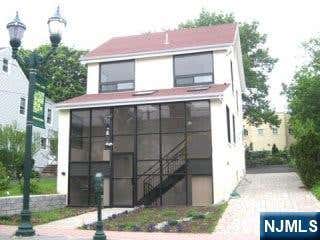 Photo of 1633 Center Avenue, Fort Lee, NJ 07024 (MLS # 26031875)