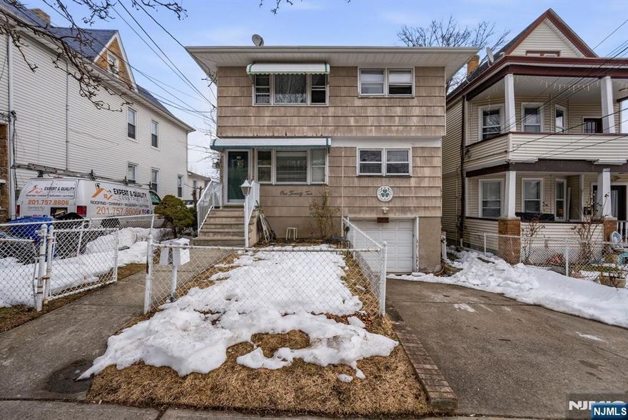 Two-family home located in a desirable neighborhood. Each unit offers 3 bedrooms, generous living space, and ample storage throughout. Partially finished walkout basement includes additional room and provides direct access to a spacious private backyard. Separate utilities.
