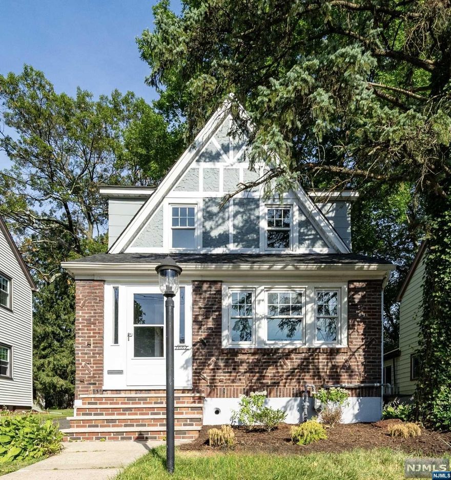 *** HIGHEST AND BEST DUE BY THURSDAY AUGUST 8th 2:00PM *** Great opportunity to buy a renovated starter home in Bergen County with LOW TAXES! NYC bus stop is 2 blocks away. Renovated Tudor home features 2 bedrooms + bonus den (can be used as 3rd bedroom), 2 bathrooms, and 3 cars driveway with 1 car garage. BRAND NEW KITCHEN, BATHROOMS AND PVC PLUMBING THROUGHOUT! Freshly painted interior and exterior. First floor has an entry foyer, living room, decorative fireplace, dining room, kitchen and half bathroom. Second floor has 2 bedrooms and 1 full bathroom. Third floor has a finished attic. Finished basement has washer dryer hookups. New luxurious kitchen includes stainless steel appliances stove, refrigerator, microwave, dishwasher, quartz countertop with backsplash, soft close shaker cabinets and a waterfall breakfast bar. Bonus full house backup generator, ductless central air 3 zone mini split system, wall/ window AC, hardwood floors, deck and fenced in backyard.