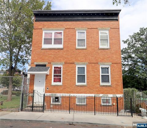 Photo of 24 Parkhurst Street, Newark, NJ 07114 (MLS # 25033146)
