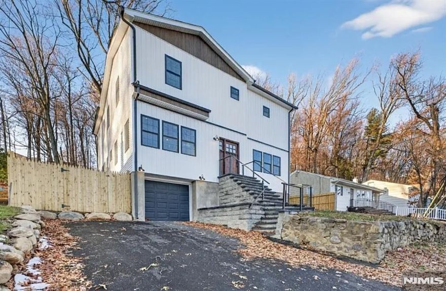 A Brand-New Home in the Heart of Rockaway. Set on a quiet street in the desirable community, this beautifully built 5-bedroom, 3.5-bath with 2,468 sq ft of finished living space plus additional finished basement area, this home combines modern design with everyday functionality. Step inside to an inviting open layout where the kitchen takes center stage with quartz countertops, custom cabinetry, and stainless steel appliances. Bright living and dining areas with clean lines and abundant natural light create a warm, contemporary feel. The spacious primary suite is a true retreat with a spa-like bath and walk-in closets, while four additional bedrooms provide comfort and flexibility. The finished basement adds valuable extra living space, perfect for a recreation room, media room, or gym. With an attached one-car garage, brand-new systems, windows, roof, and stylish finishes throughout, this home offers peace of mind and a move-in ready lifestyle. All of this comes with the added benefit of a vibrant community offering year-round amenities, including Swimming, Boating, Fishing, Pickleball, Club House activities, and neighborhood events.