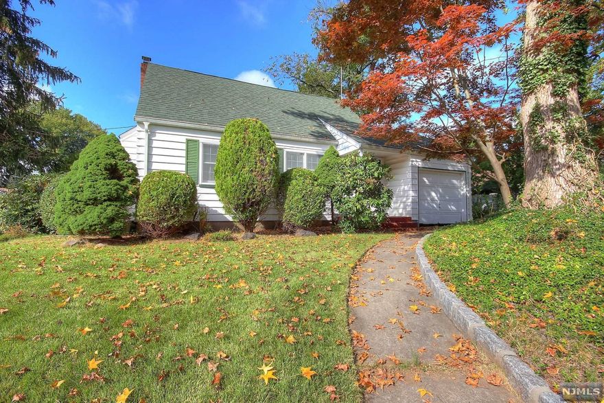 MULTIPLE OFFERS HIGHEST and BEST due by NOON TUESDAY, October 12. Welcome to this Charming Cape Cod located on one of the nicest streets in Dumont. First floor features bright Living Room, Kitchen with door leading to yard, 2 Bedrooms and Full Bath. Second floor features additional Large Bedroom. Nice size basement with high ceilings and plenty of storage. Hardwood floors. There is a 1-car attached garage with storage over garage. House being sold as is. Oil tank in basement not in the ground. Needs work and updating but has lots of potential. Excellent opportunity to buy in Bergen County at a great price.