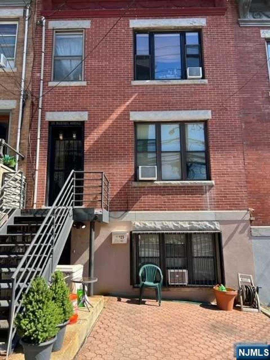 Discover an authentic piece of Edgewater's history in this remarkable Brownstone, originally built in 1895. Nestled among just six brownstones in the town, this three-family residence offers a rare opportunity for investors. Situated just a stone's throw away from River Road, you'll find convenience at its finest with proximity to Whole Foods, an array of shopping options, delectable restaurants, and seamless access to all major bus routes. Plus, a short drive brings you to both the GW Bridge and the Ferry, making this location a commuter's dream. This Brownstone also boasts four parking spaces! Enjoy stunning views of the iconic New York skyline, adding an extra layer of appeal to this fantastic investment opportunity. With low taxes and a prime location, this property is not only a piece of history but also a savvy choice for those seeking an excellent return on investment. Don't miss your chance to own a slice of Edgewater's past while securing your financial future.