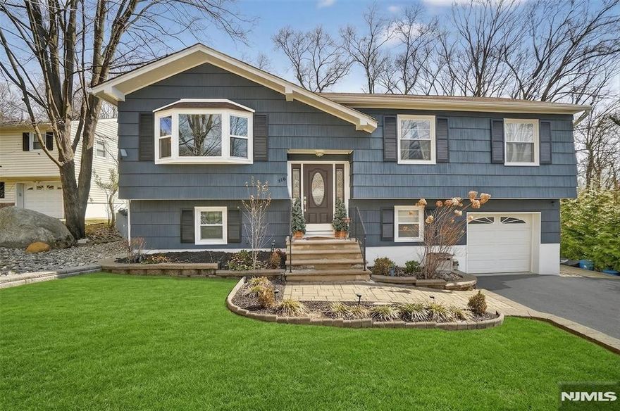 Welcome to Bloomingdale, New Jersey, where comfort, space, and a connection to nature come together in this beautifully maintained three-bedroom bi-level home. From the moment you arrive, youâ€™ll notice the freshly painted exterior and new bay windows that enhance both curb appeal and natural light throughout. New deck. New windows. The main level offers a functional layout with granite countertops in the kitchen, three well-sized bedrooms, and a fully renovated bathroom (2025). The living spaces are warm and inviting, ideal for everyday living and easy entertaining. The ground level provides exceptional flexibility, featuring a spacious family room, a dedicated office, and a recreation room with an attached full bathroom and laundry area. This level walks out to a paver patio, creating seamless indoor-outdoor living. Step outside to enjoy a brand-new deck overlooking a landscaped backyard with a tranquil pond and waterfall. Multiple outbuildings offer space for hobbies, storage, or workshop use. The property backs to trees, adding privacy and a peaceful setting. Additional features include a one-car garage, attic storage, central air conditioning, and public water, sewer, and natural gas. Conveniently located near major highways, shopping, and dining, and just minutes to Norvin Green State Forest, parks, recreation programs, a dog park, and pickleball courts, this home offers a well-rounded lifestyle in a desirable Bloomingdale location.