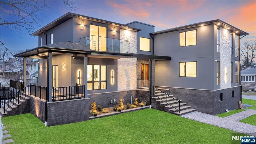 283 Bluff Rd, set on an oversized corner lot in the highly sought-after Abbott Blvd section of Fort Lee, a brand-new masterpiece that seamlessly blends modern living with contemporary architecture. The homeâ€™s exterior design features clean lines and multiple glass balconies that create a sophisticated and visually dynamic presence. Offering over 7,000 sqft of thoughtfully crafted living space, the dramatic two-story foyer sets the tone, where a stunning staircase with glass railings creates an immediate architectural focal point. Natural light fills the open-concept layout as formal and casual living spaces flow together. Designed for both style and function, the kitchen features custom cabinetry, an oversized island with a built-in breakfast table and GE Monogram appliance package. The first floor also offers a dedicated office or den, providing the perfect environment for working from home or creating a quiet retreat. Upstairs, the second level balances privacy with generous proportions. Four oversized bedrooms provide comfort and space, including a serene primary suite with walk in closet and spa bath. The fully finished lower level extends the homeâ€™s livable space with soaring nine-foot ceilings and versatile areas ideal for recreation, media, fitness and a bedroom complete with a full bathroom. Additional features include exterior lighting package, multi zone heating and cooling, security cameras, speakers, Navien tankless systems, 300 Amp Service, Irrigation System