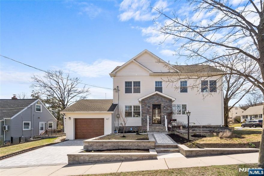 Welcome to your dream home in the heart of Clifton's sought-after Albion section! This stunning renovated colonial offers 4 spacious bedrooms and 3 modern bathrooms. Step inside to the first floor featuring a living room,dining room, and a beautifully updated kitchen. First-floor bedroom and a full bathroom complete the level. Upstairs, you'll find three additional bedrooms, including a luxurious primary suite with a private full bath and ample closet space. A third full bathroom serves the remaining two bedrooms, ensuring space..The finished basement provides even more room to relax, entertain, or work from home, while the attached garage adds everyday convenience. Located close to top-rated schools, beautiful parks, and major highways, this home blends suburban tranquility with urban accessibility. Don't miss your chance to own this move-in-ready gem in one of Clifton's most desirable neighborhoods!