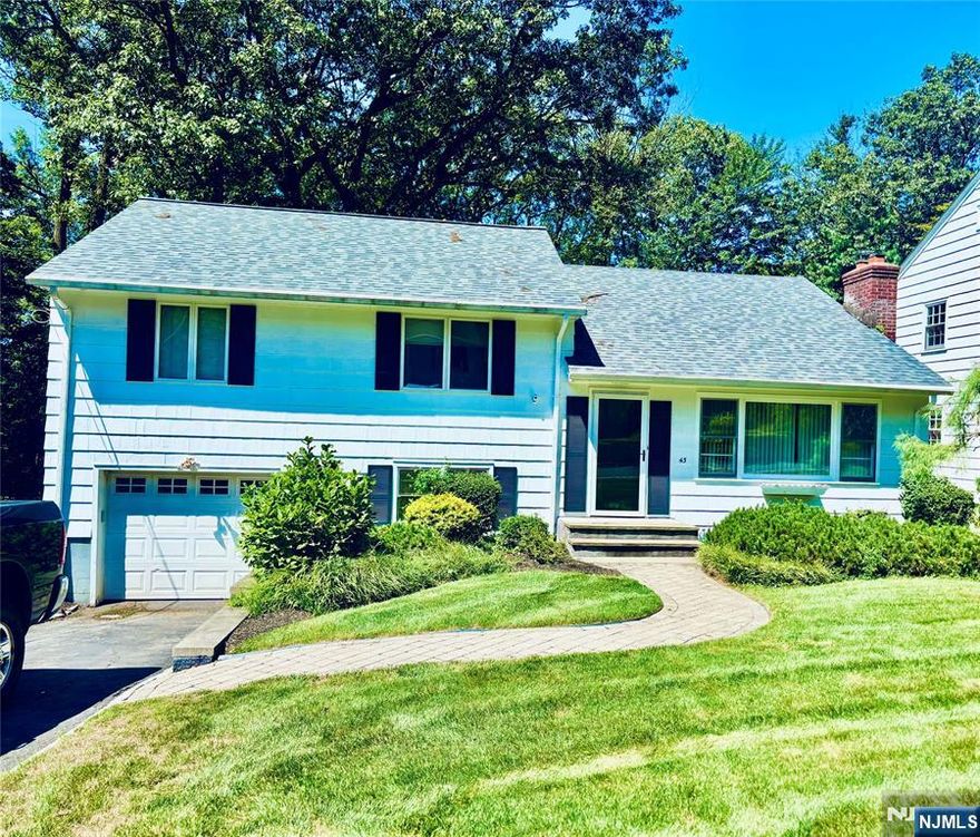 St. Cloud Living! Tucked away on a quiet, tree-lined cul-de-sac in West Orange's sought-after St. Cloud section, this 4-bedroom, 2-bath split-level home offers comfort, convenience, and character. Step inside to a bright, versatile layout where the inviting living room with a wood-burning fireplace sets the perfect tone for cozy evenings. Four spacious bedrooms and two full baths provide plenty of room for today's lifestyle, while the split-level design creates easy flow between living areas with just the right amount of privacy. Out back, enjoy your own private oasis a level, fenced-in yard ideal for entertaining, play, or relaxation. A unique double-access garage adds everyday convenience with direct entry to both the home and backyard. Located just minutes from shopping, highways, and commuter routes, this home also benefits from a West Orange jitney service for easy connections to buses and trains. Recreation is right around the corner at the South Mountain Recreation Complex, featuring Turtle Back Zoo, Codey Arena, mini golf, waterfront dining, and scenic walking and hiking trails. With a prime location, charming fireplace, and a peaceful cul-de-sac setting, this St. Cloud home is ready to welcome its next chapter.Don't miss it!