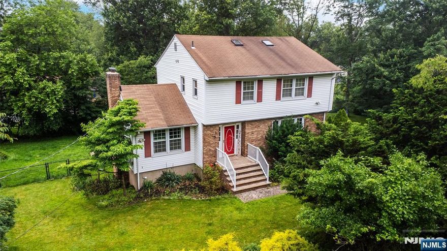 Welcome to your perfect retreat in the heart of Wayne, NJ! This charming 3-bedroom, 2.5-bathroom home is nestled in a private, secluded settingâ€”ideal for those seeking peace and quiet without sacrificing convenience. Step inside to find hardwood floors throughout, spacious living areas, and a bright kitchen that opens directly to a deckâ€”perfect for grilling, entertaining, or enjoying your morning coffee. The private yard offers plenty of space to relax or play, and the two-car garage adds ease and functionality. With its sought-after location and serene surroundings, this home checks all the boxes. Move right in and make it yours!