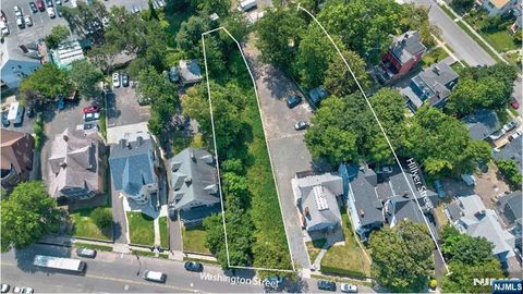 Photo of 65 Washington Street, East Orange, NJ 07017 (MLS # 26000790)