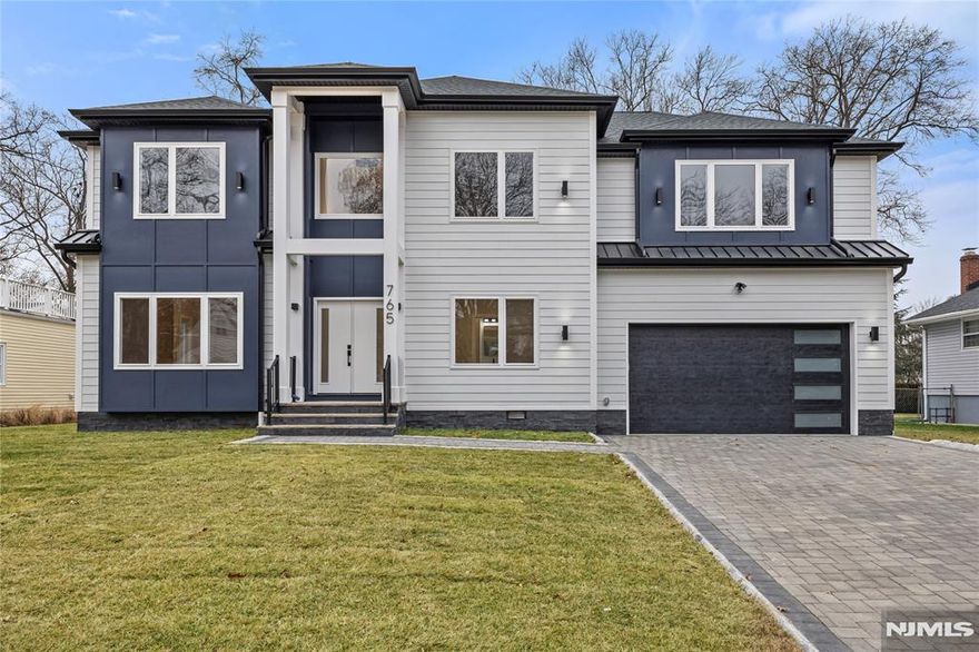 Approx 4000 sq ft East facing new construction home over small portion of original foundation- 5 master bedrooms suites!- each suite with private bath & walk in closet and closet organizers! Principal bedroom has tray ceiling, dual walk-in closet, double head shower and tub! 6 1/2 baths in total. Main level has 9' ceilings and spacious open concept Living room with electric fireplace perfect for daily living and entertaining, formal dining room, 1 bedroom/office with a full bathroom and a half bathroom. Gorgeous kitchen with island & quartz tops with stainless appliances. Finished basement with recreation room and full bath. 2 car built in garage with 2 outlets adequate for EV chargers! Ample parking on paverstone driveway. Hardwood floors, tiled baths, 2 separate gas HVAC heating and cooling systems, 200 amp electric. Private fenced in yard with new sod. This prestigious home is located in a wonderful neighborhood, The Van Saun Bergen county park - the County Zoo. close to NYC transportation. River Edge offers TOP-rated schools.