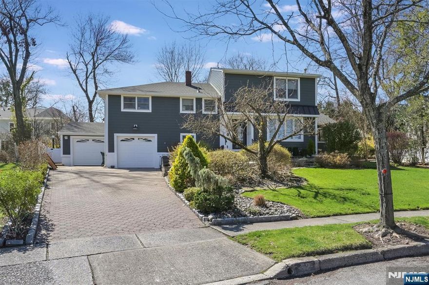 Welcome to this beautifully maintained 4-bedroom, 2 full and 2 half-bath Split-Level home, nestled on a generous 1/3-acre lot in the highly sought-after town of Glen Rock. Step into a bright Living Room that flows seamlessly into the Dining Room and Sun Roomâ€”perfect for entertaining. The kitchen is updated and features a charming Breakfast Area with a large bay window overlooking the lush backyard. Just steps down, you'll find a spacious Family Room with a cozy Fireplace and direct access to attached 2-car garage. Upstairs, the home offers an en-suite bedroom, an additional bedroom, a full bath, and laundry room. The top level boasts a stunning Primary Suite with Cathedral Ceilings, a private Bath with a separate sauna, and a fourth bedroom. Finished basement level provides even more versatile living space. Outside, enjoy a private retreat featuring a beautifully landscaped yard, a large in-ground pool, a Trex deck, and so much more. This one-of-a-kind property truly has it all!