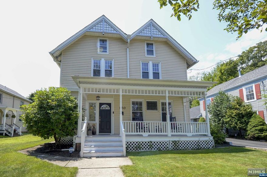 Welcome to this stunning, updated pre 1900's Victorian style Colonial. This home has been beautifully updated while maintaining the original character. A charming porch welcomes you into the front entry, flooded with natural light. Enter through the original stained glass door and easily flow into the living room with beautiful hardwood floors and an original brick fire place from 1880. A spacious formal dining room allows for easy entertaining. The updated kitchen has stainless steel appliances, recessed lighting and cabinetry that seamlessly compliments the original brick hood. A conveniently located powder room and a laundry/mud room that leads to the picturesque back yard complete the first floor. Upstairs, four large bedrooms with hardwood floors throughout and a tastefully updated full bathroom. Outside, a beautifully landscaped yard with a private paver patio, pergola and fire pit area. Two car detached garage. This home boasts charm with all the modern conveniences!